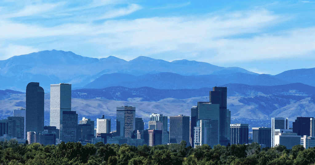 Skyline of city of Denver and mountains behind it