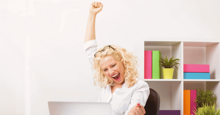 woman cheering in office